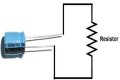 What does it mean to discharge a capacitor?